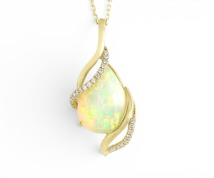 PEAR OPAL PENDANT WITH DIAMONDS IN 18K GOLD